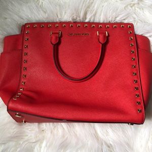 Michael Kors red/orange and gold studded purse